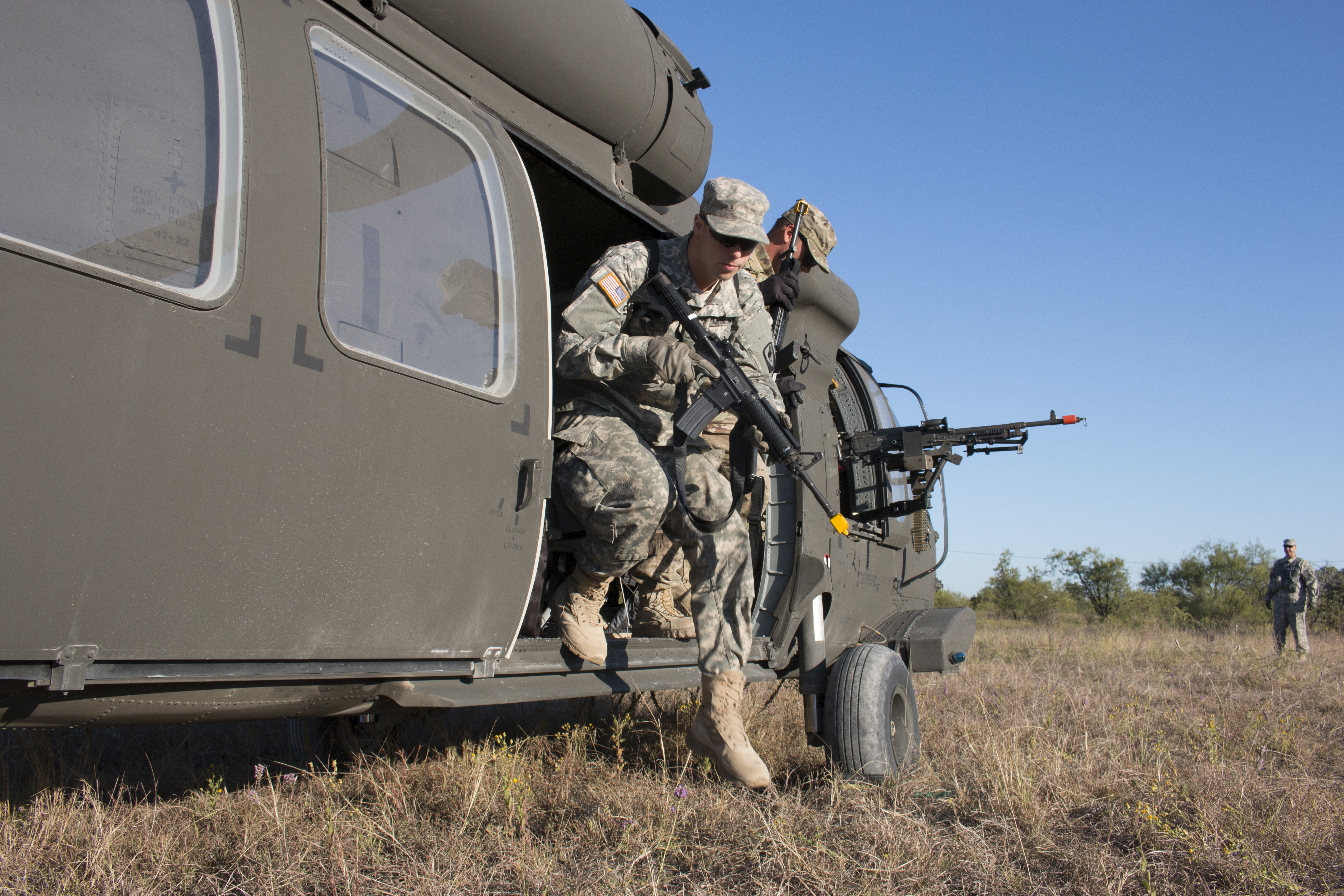 "Soldiers from the California Army National Guard 1st Battalion, 140th Aviation Regiment, 40th Combat Aviation Brigade hit the ground running during a small unit tactics exercise at Fort Hood, Texas, Oct. 19, 2015."