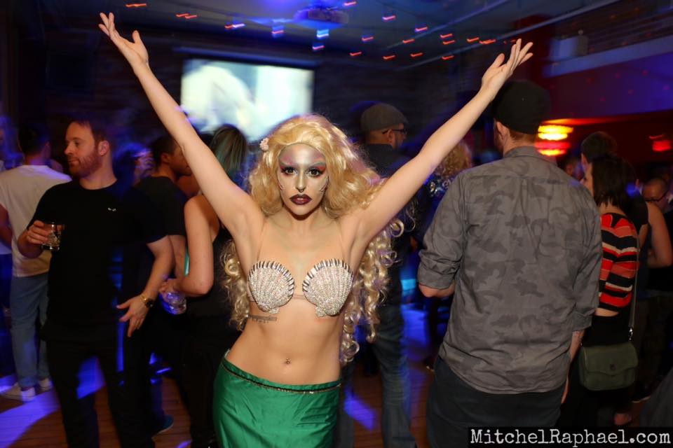 Courtney Conquers in mermaid drag