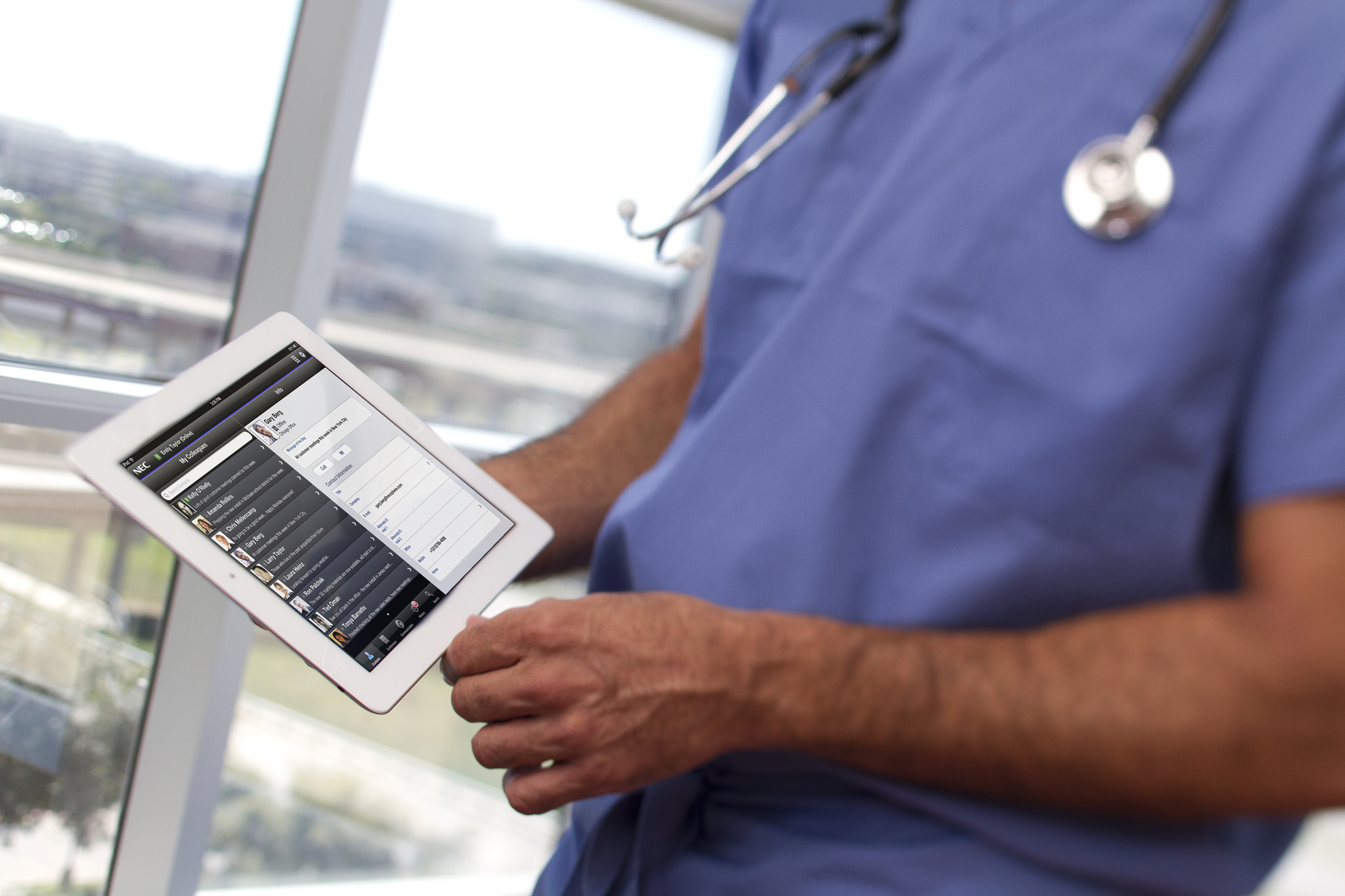 doctor with tablet