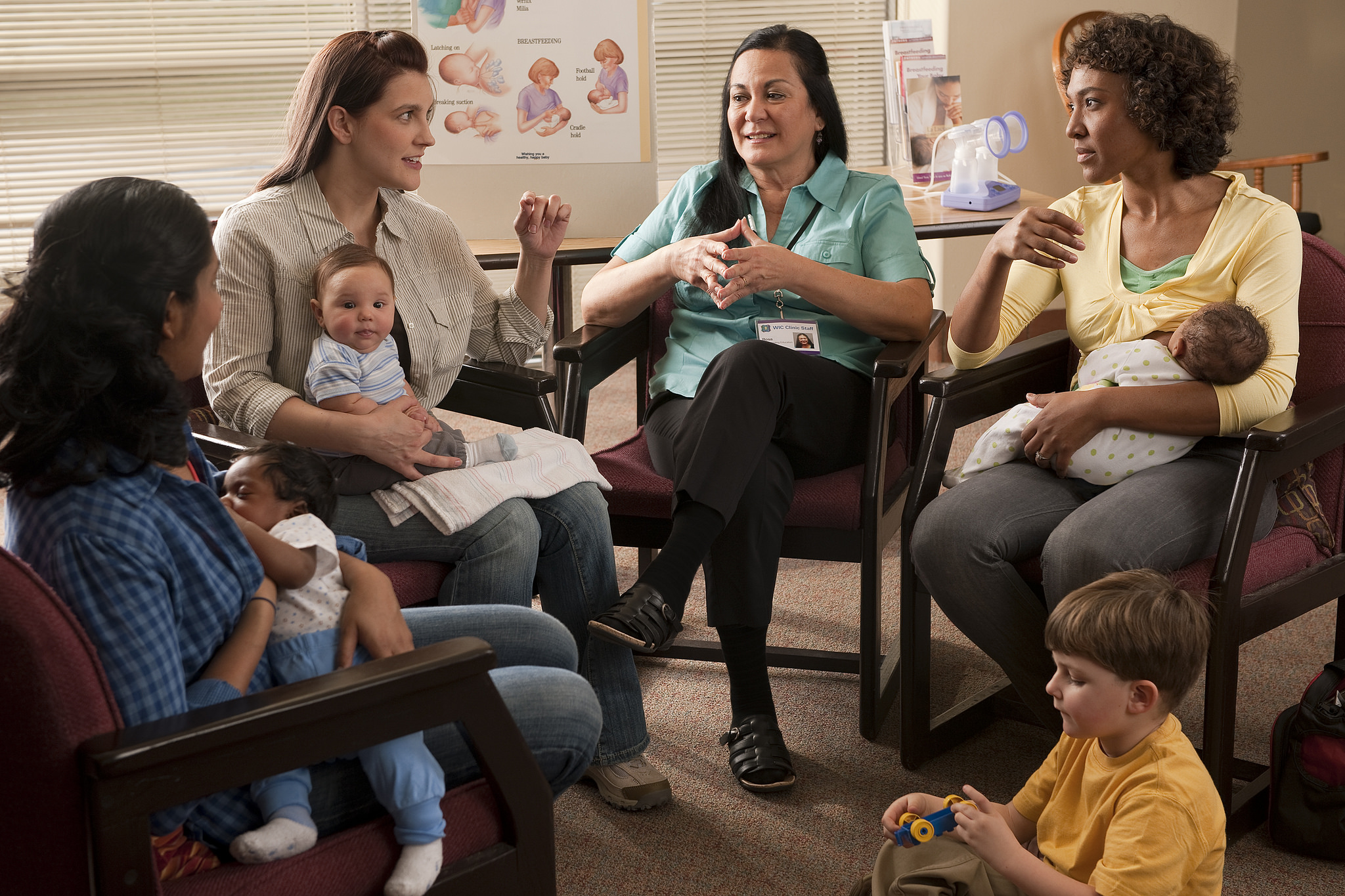 New moms participating in a group discussion