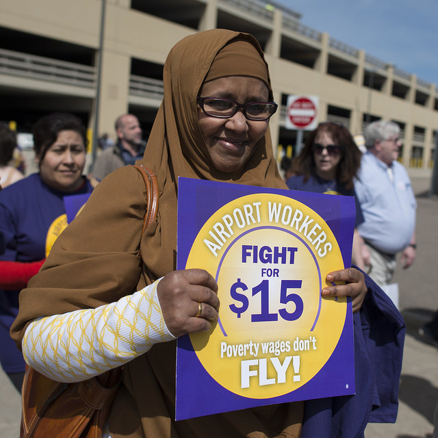 Airport employees protest minimum wage
