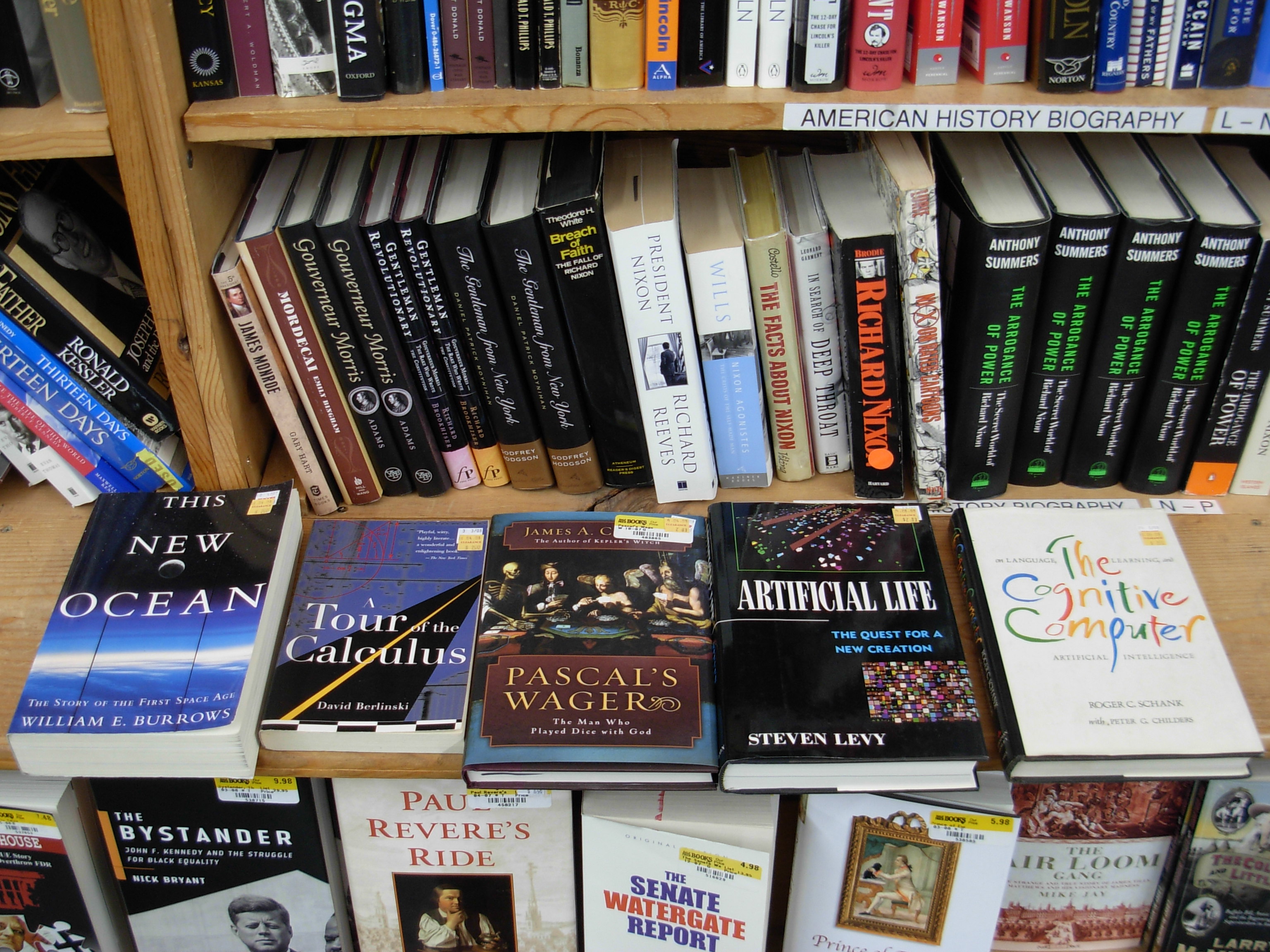 Discounted books laid out on a desk