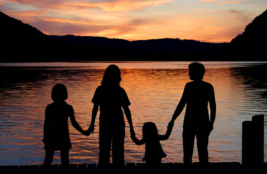 siblings being photographed together