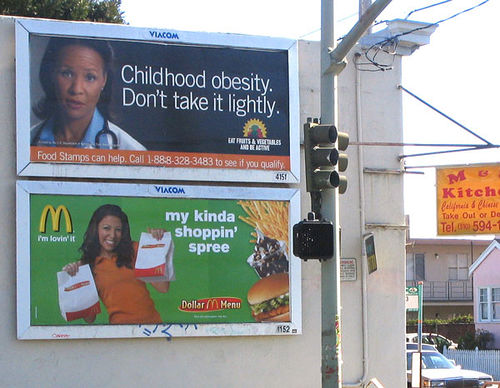 childhood obesity ad next to McDonalds ad