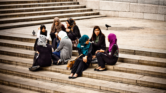 Muslim women on steps. 