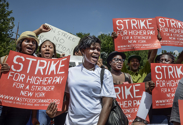 Fast food workers and supporters protest for higher wages in New York. 