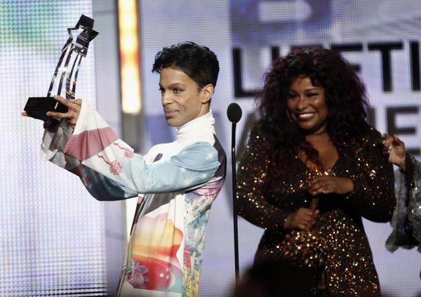 Prince accepts the Lifetime Achievement Award from Chaka Khan at the BET Awards