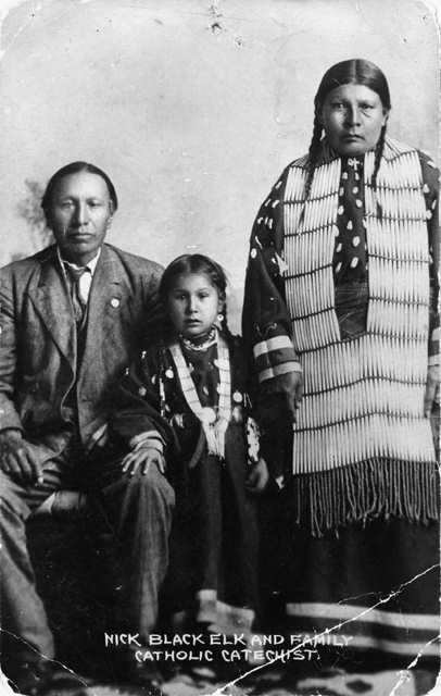 "Nicholas Black Elk, daughter Lucy Black Elk and wife Anna Brings White" (1910)