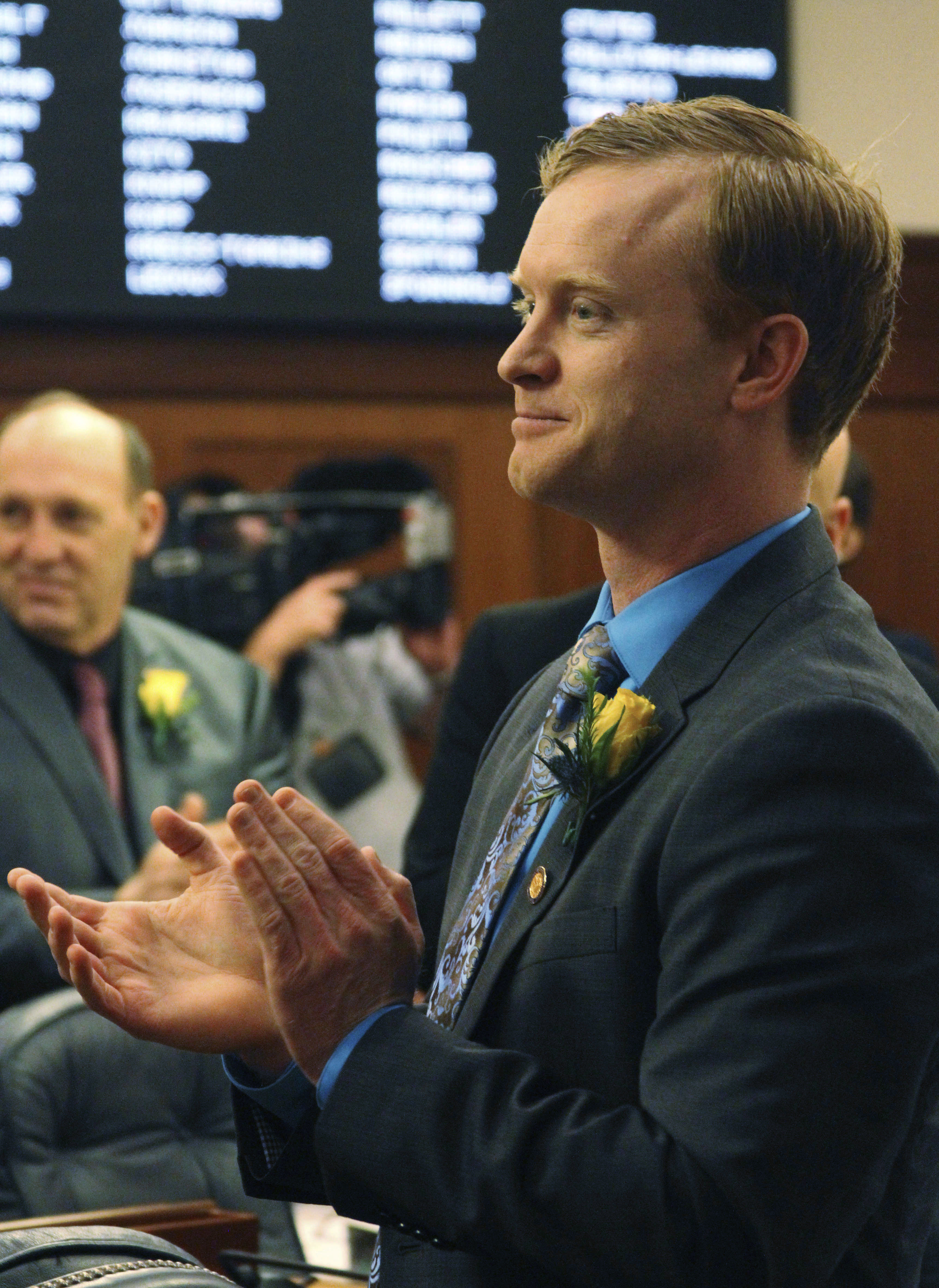 "In this Jan. 17, 2017, photo Alaska state Rep. David Eastman applauds in the House chamber in Juneau, Alaska."
