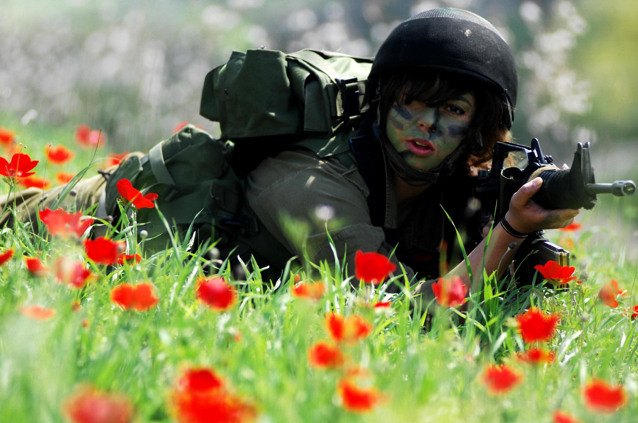 Female Israeli Soldier in a Field of Flowers