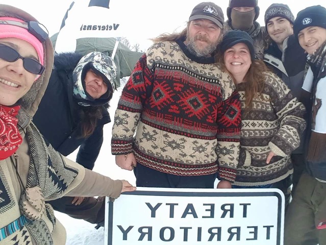 Aubree Peckham (far left) and other activists at the Standing Rock camps. 