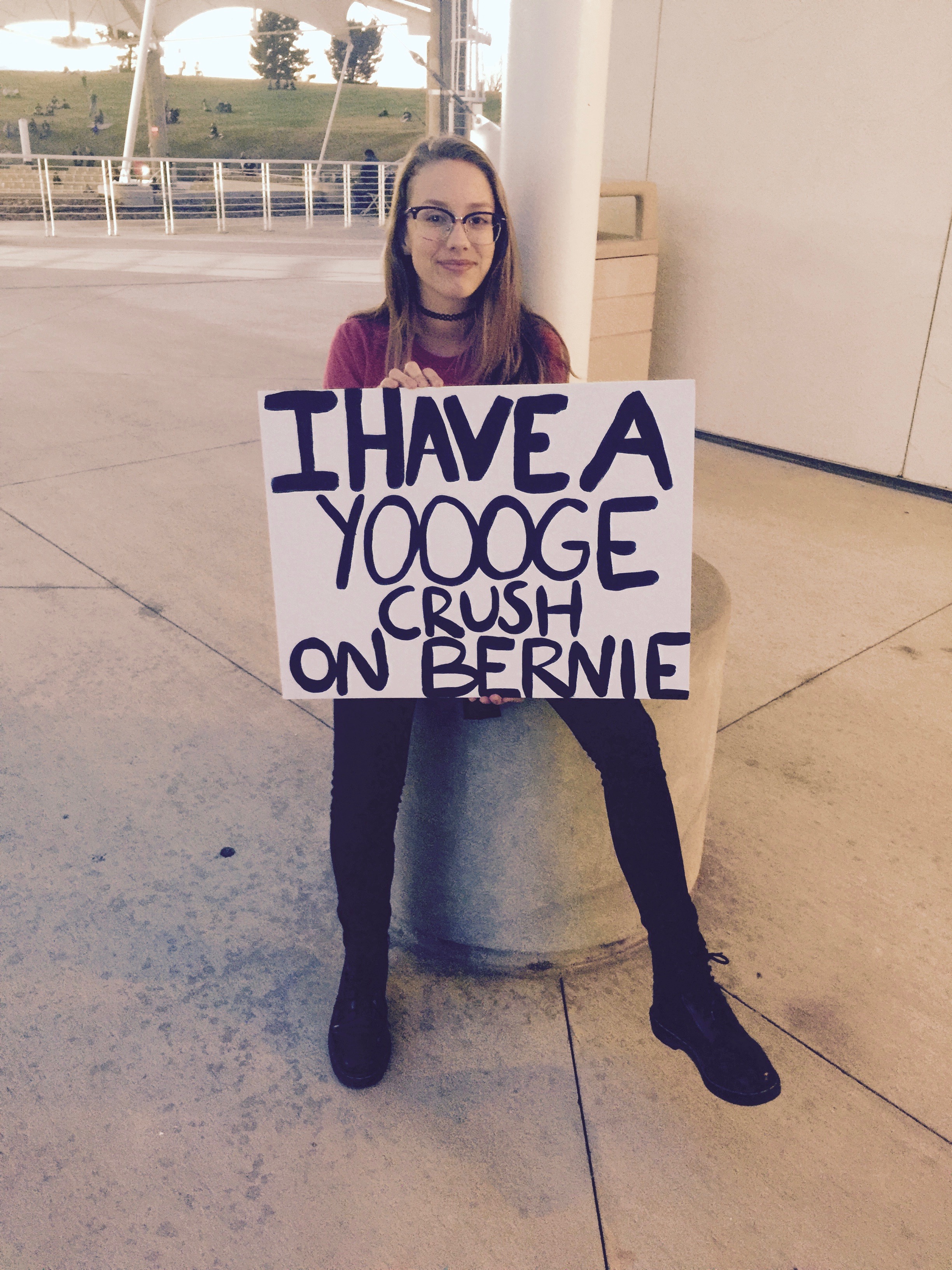 Summer, with sign at a Bernie Sanders rally in Henderson, Nevada