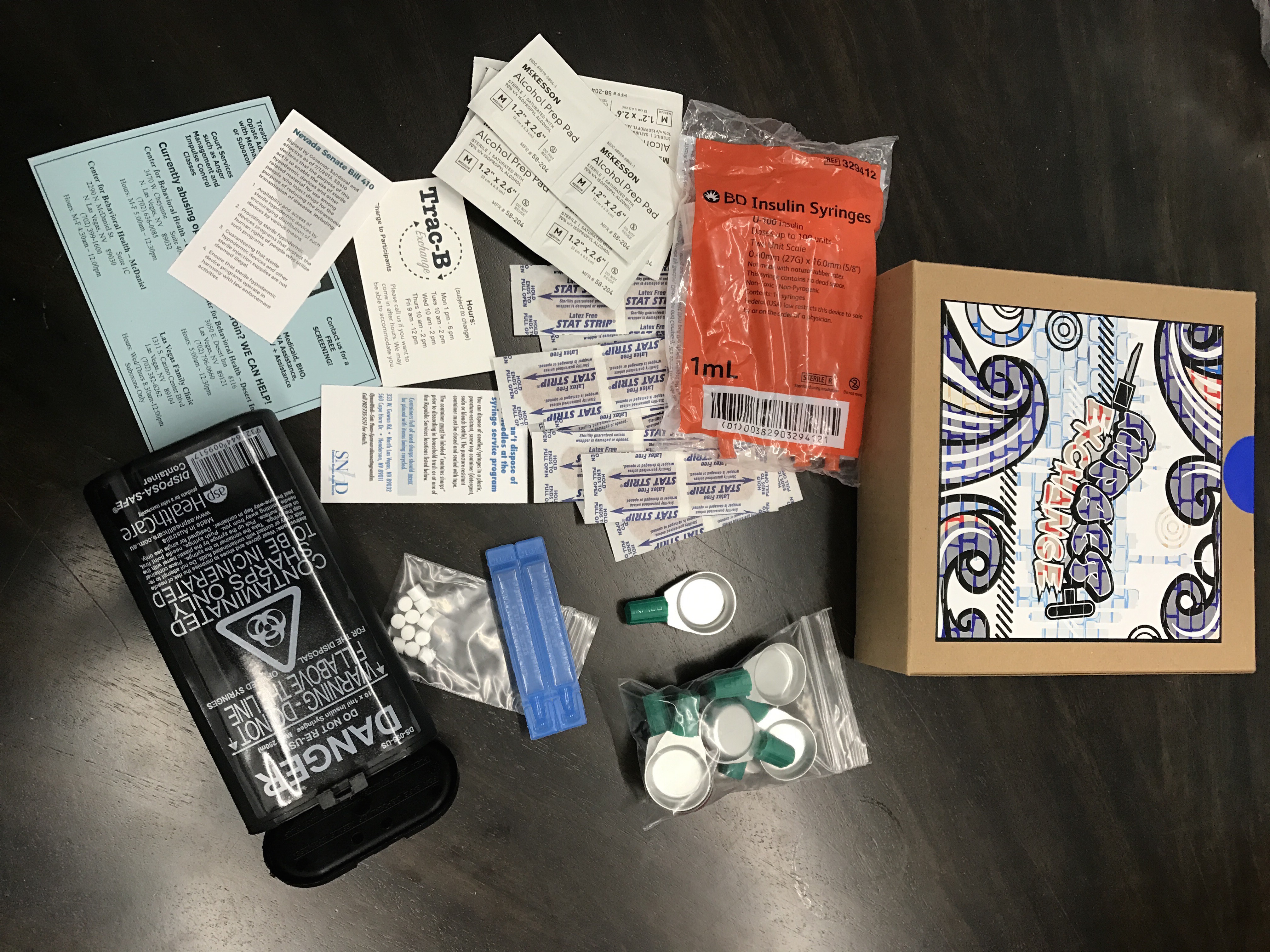 Vending machine packets contain syringes and IV drug tools