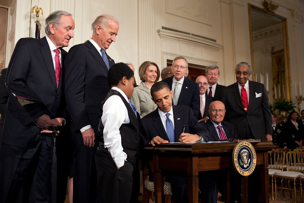 obama signing affordable care act