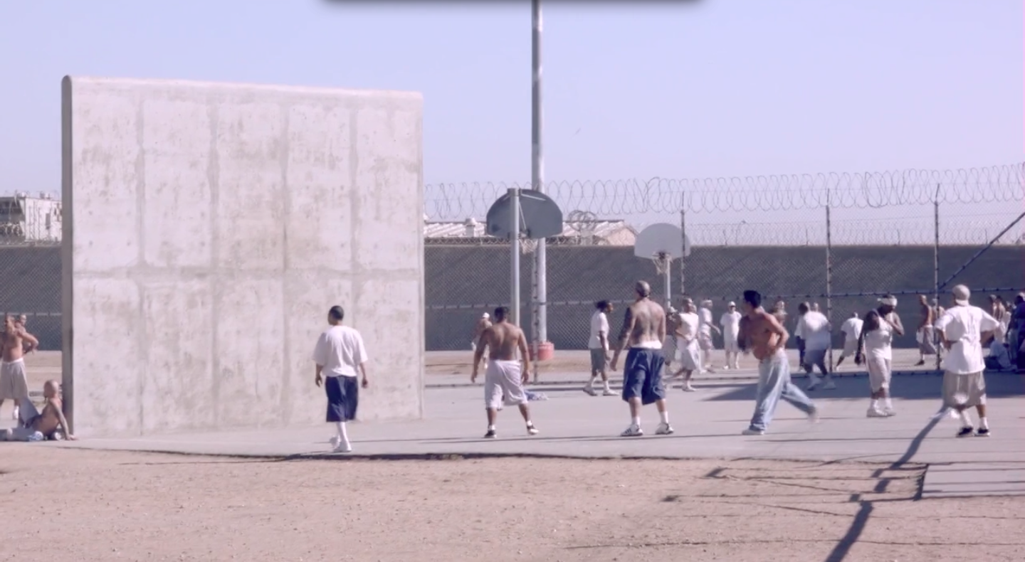 Prisoners outside in prison yard