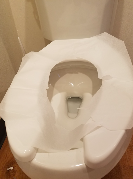 A toilet seat cover. 