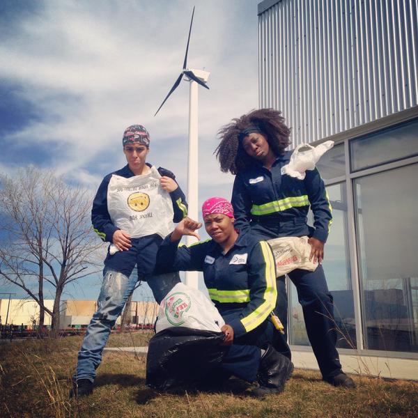 Ladies whose job it is to manually pull plastic bags from recycling line. 