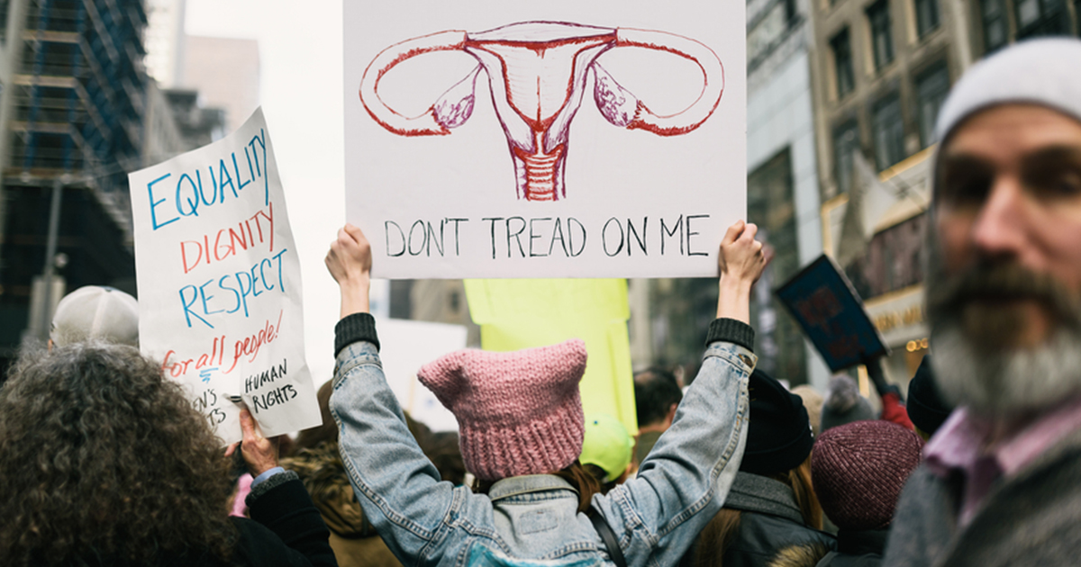 woman-holding-sign