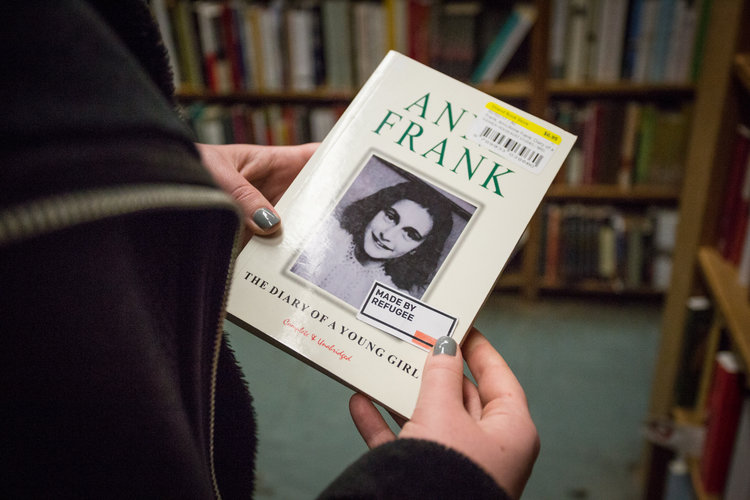 Photo of The Diary of Anne Frank with a "Made by Refugee" sticker