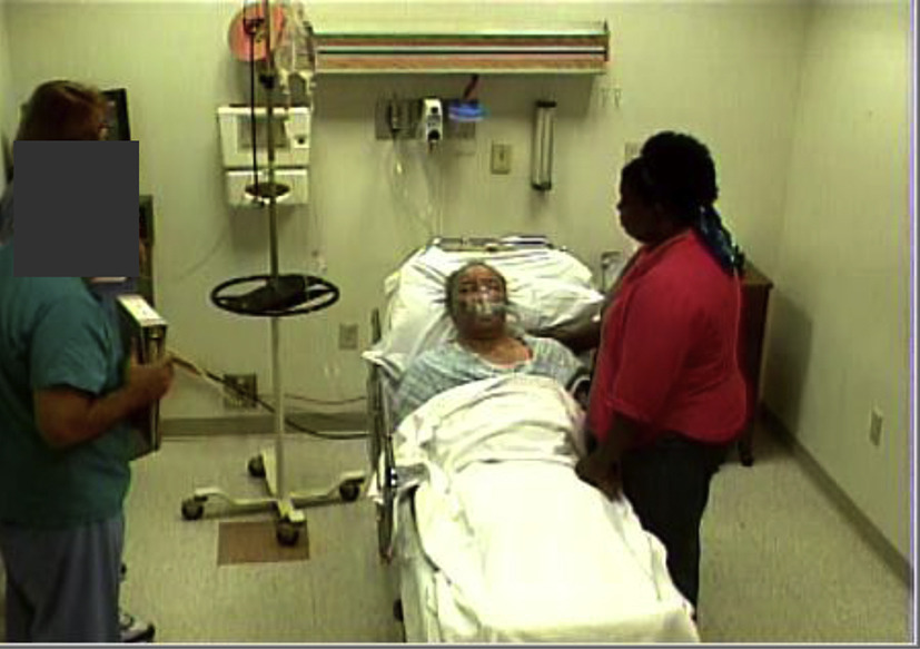 Footage of Physician Standing  >12" from Black Patient