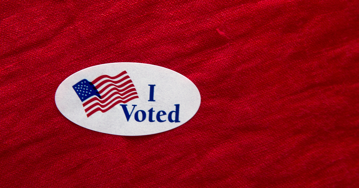 i-voted-sticker-on-red-background