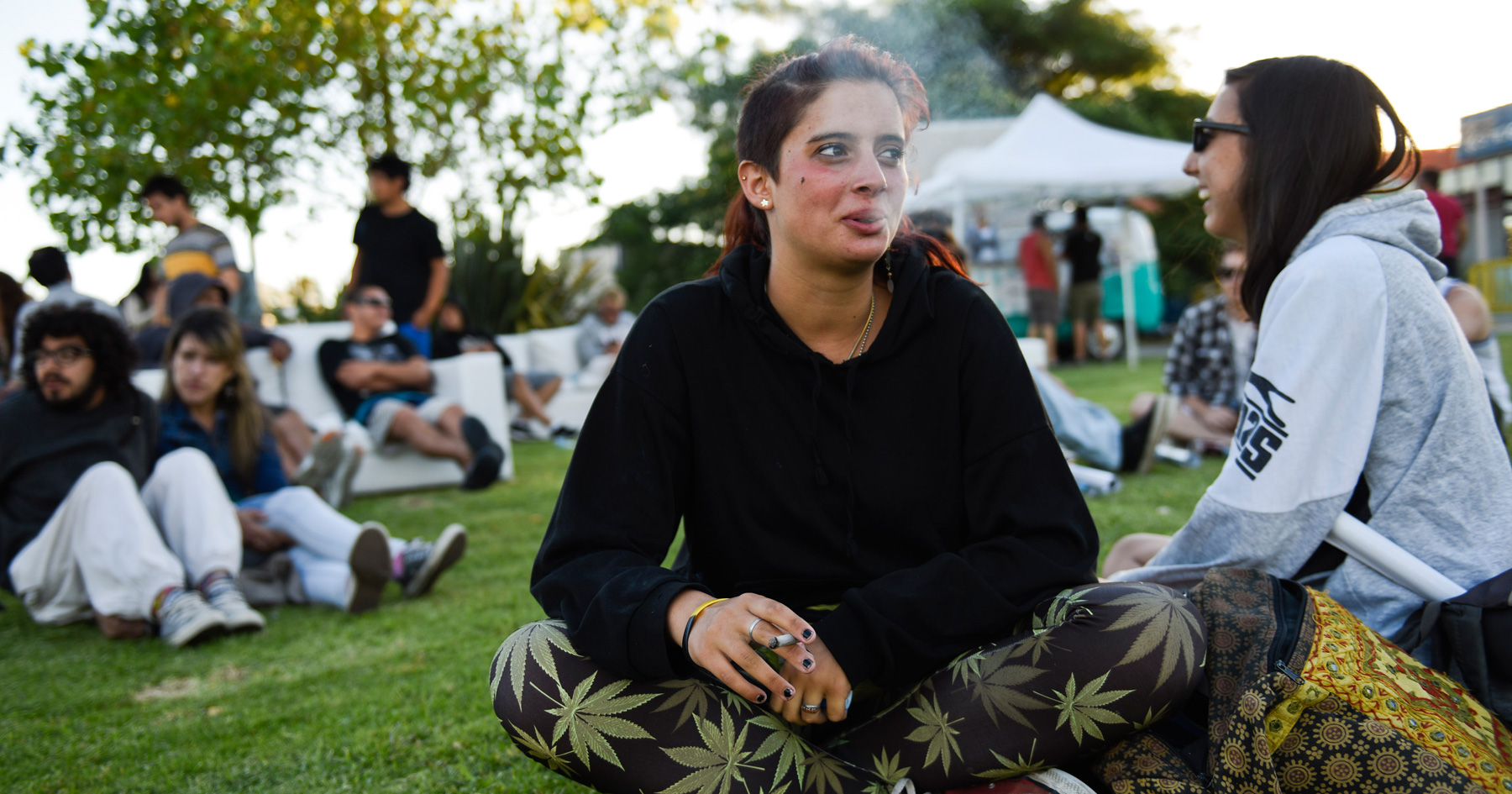 woman-smoking-marijuana-in-a-park