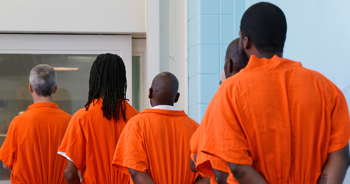 inmates-in-orange-jumpsuits