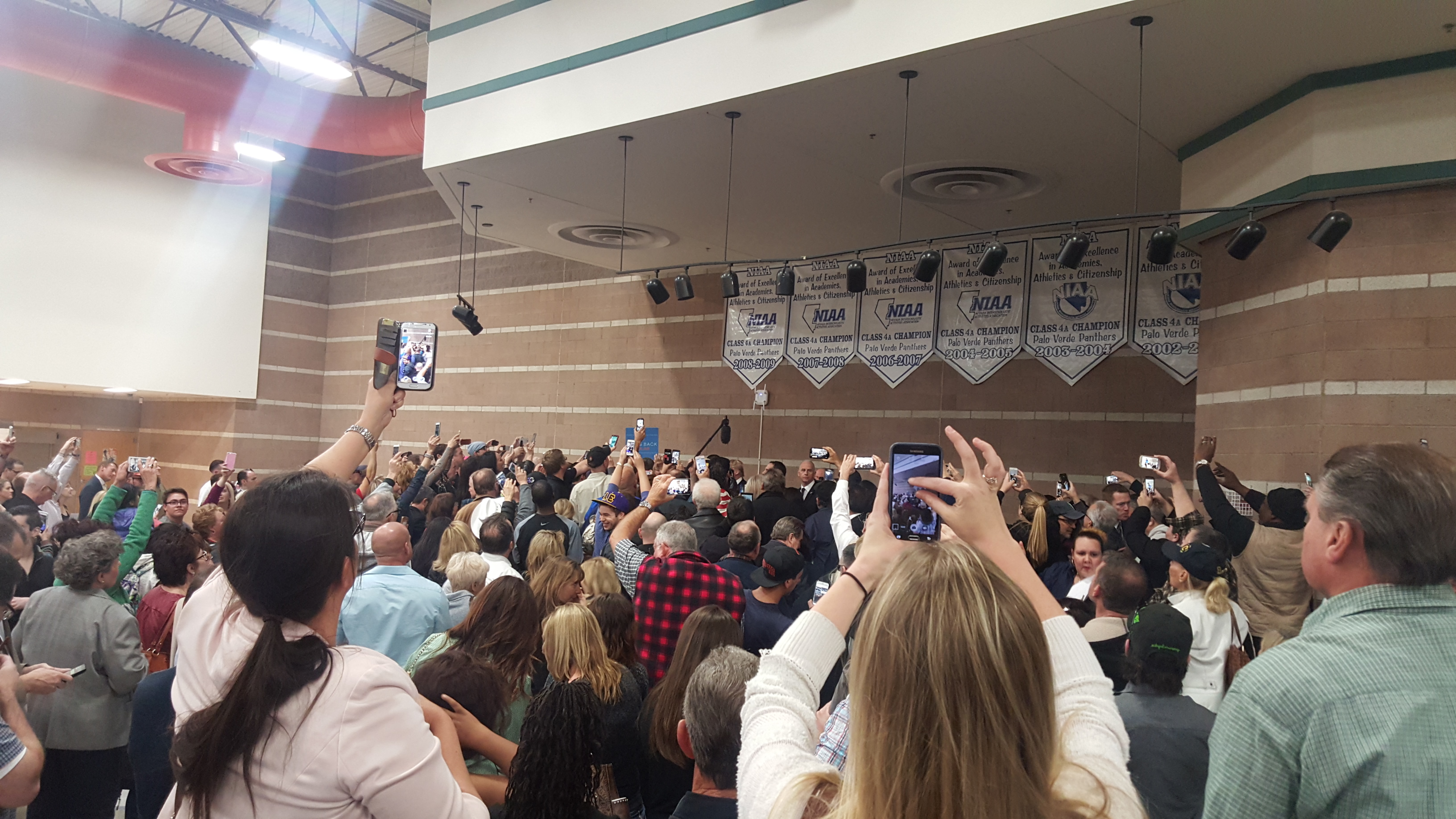 People swarming Donald Trump at Palo Verde High School