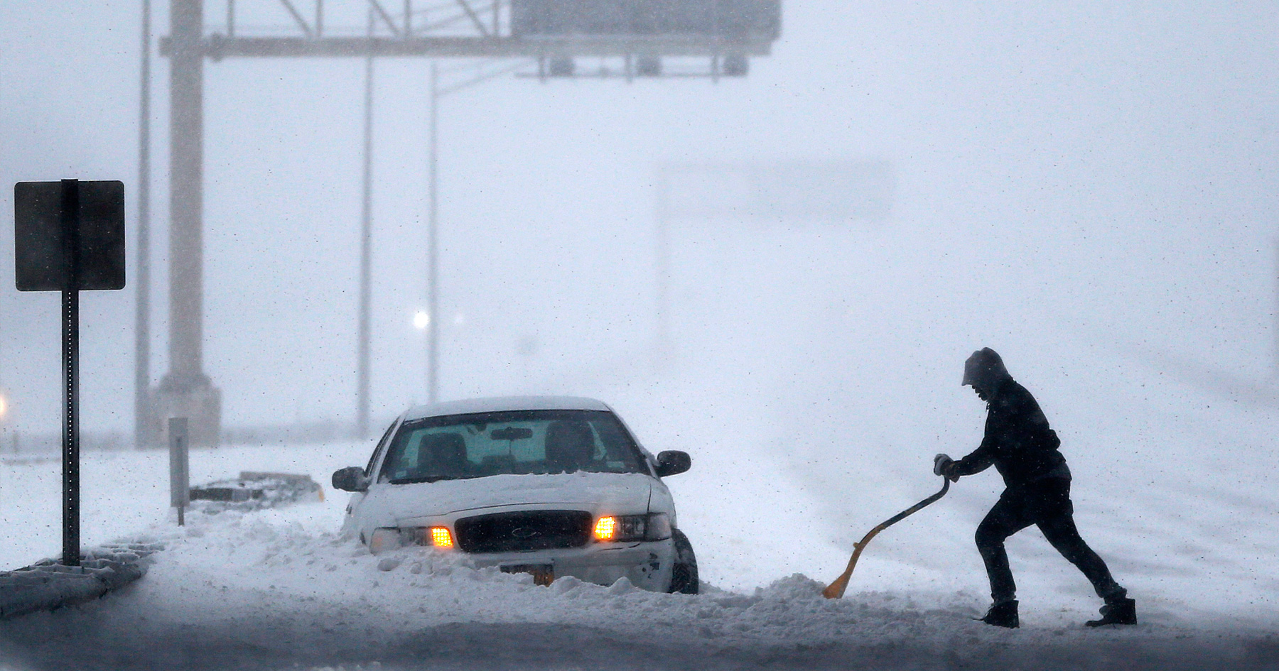 man-shoveling-snow