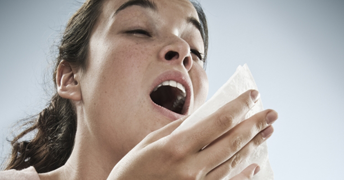 woman-sneezing