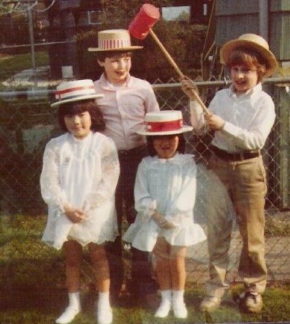 Elin Riggs (front, left) and her family when she was a child. 