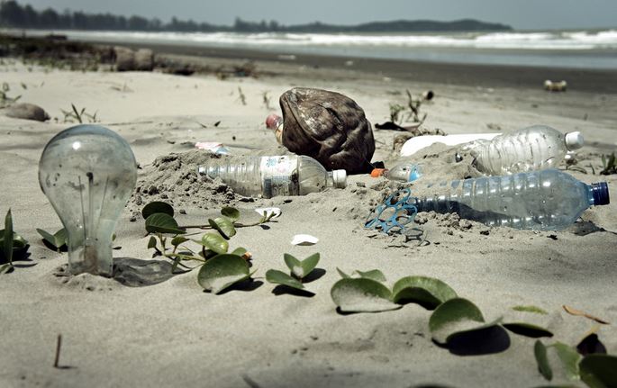 Water bottle on sand