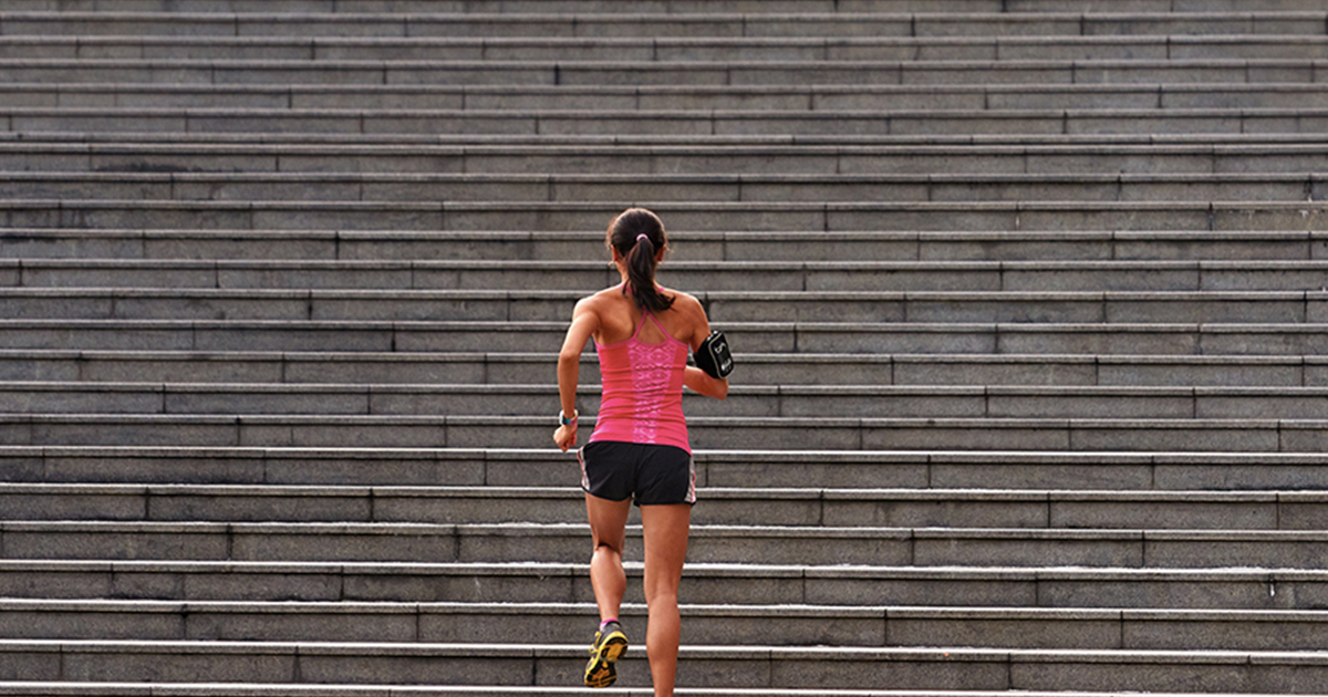 woman-running-up-stairs